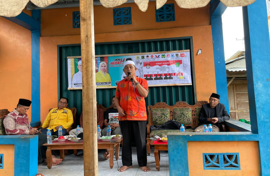 Diguyur Hujan, Warga Tetap Hadir di Kampanye Calon Bupati Inhil Haji Herman
