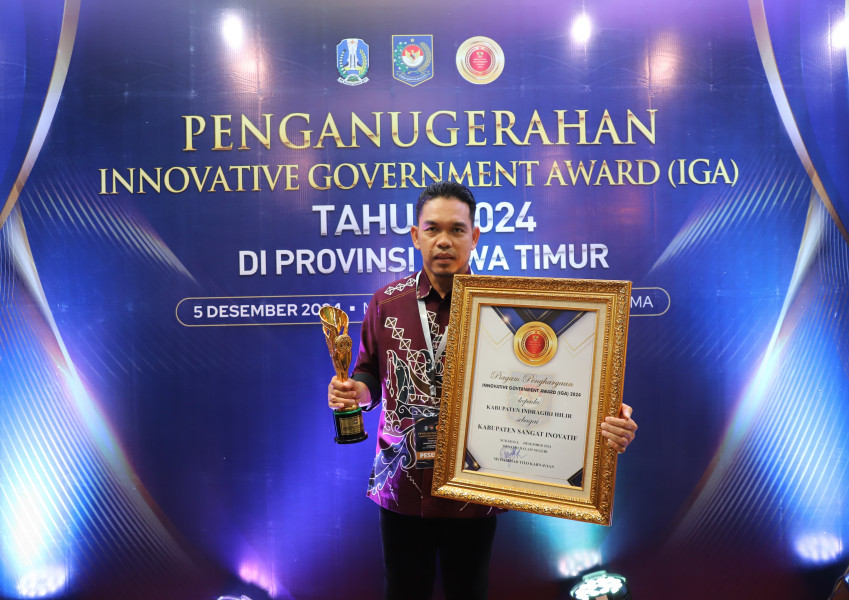 Pj Bupati H. Erisman Yahya Terima Penghargaan Kabupaten Sangat Inovatif di IGA 2024