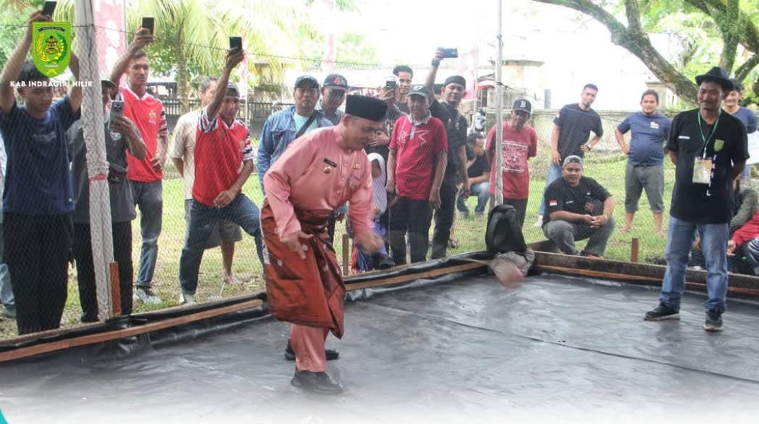 Meriahkan Milad ke-60, Bupati Inhil Resmikan Lomba Gasing Tradisional