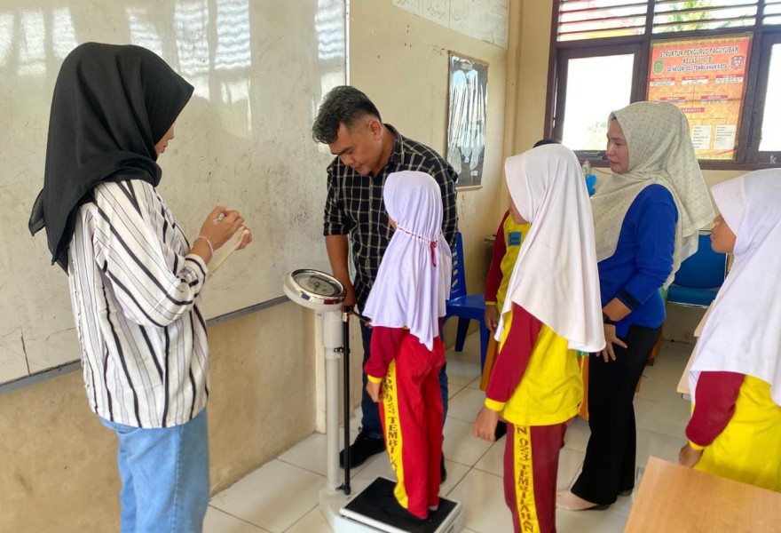 Polres Inhil Bimbingan Teknis Edukasi Gizi di SDN 023 Tembilahan Kota